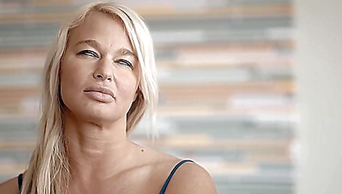 Sexy blonde gets fucked by a huge cock